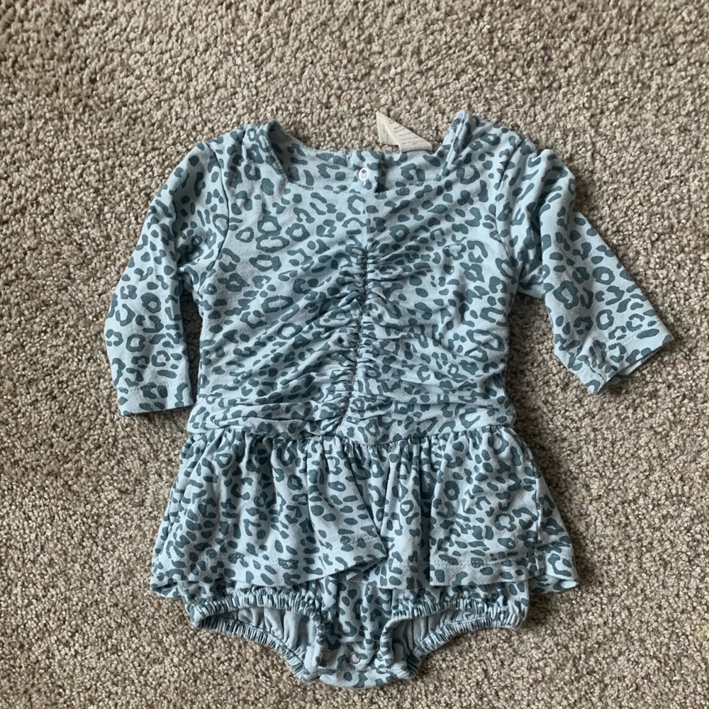 Kate Quinn longsleeve cheetah skirted bodysuit
